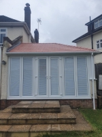 Warm roof conservatory with flush PVC resurgence frames and internal blinds