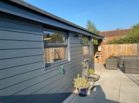 Garden room with cement Hardie Board cladding
